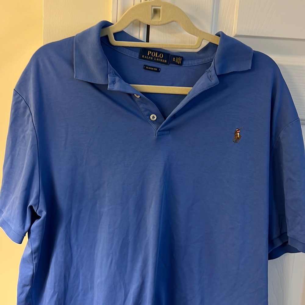 Classic fit blue polo size XL.